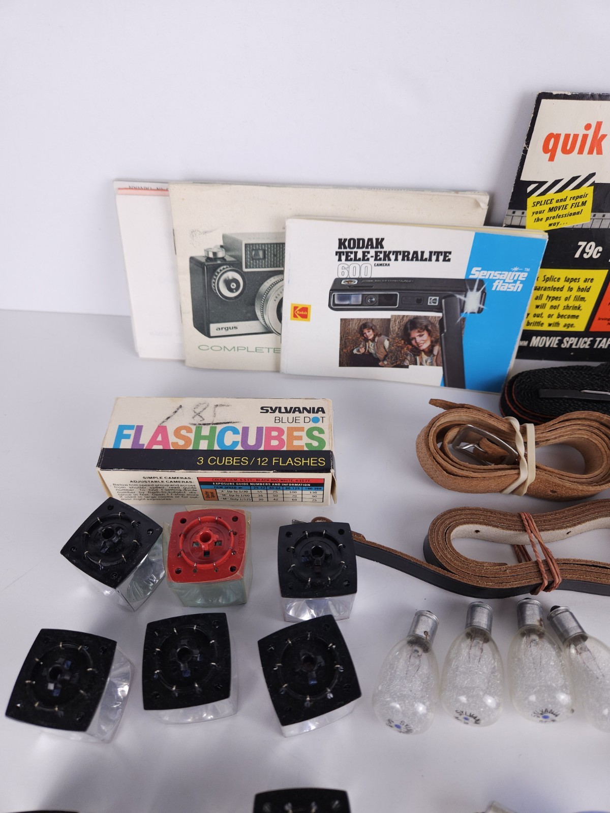 Junk Drawer Lot Of Vintage Camera Camcorder Parts – Bulbs Straps Tapes Manuals