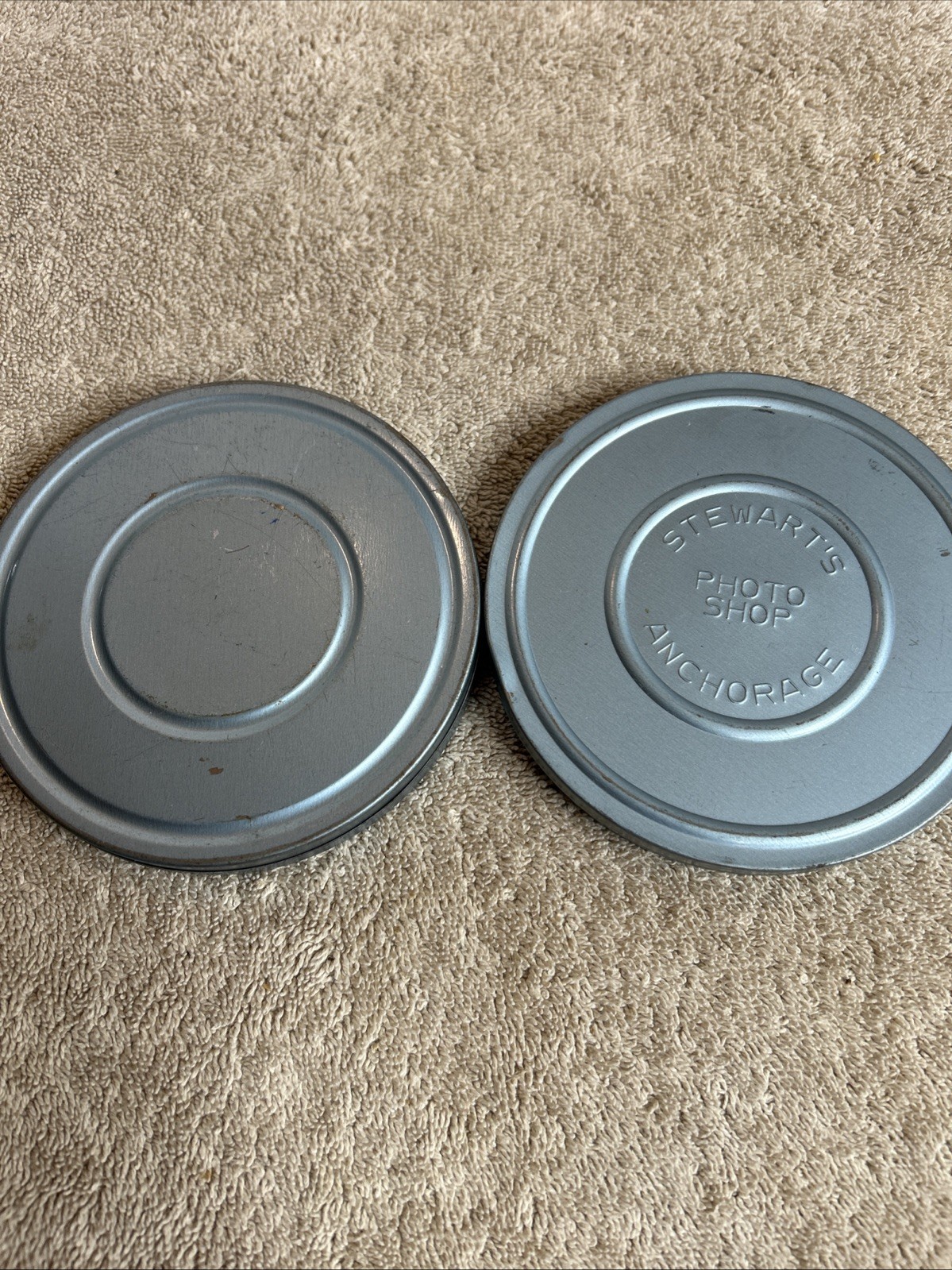 Two Vintage Stewart’s Anchorage Film Canisters In Grey With Mixed Reels 100-R07