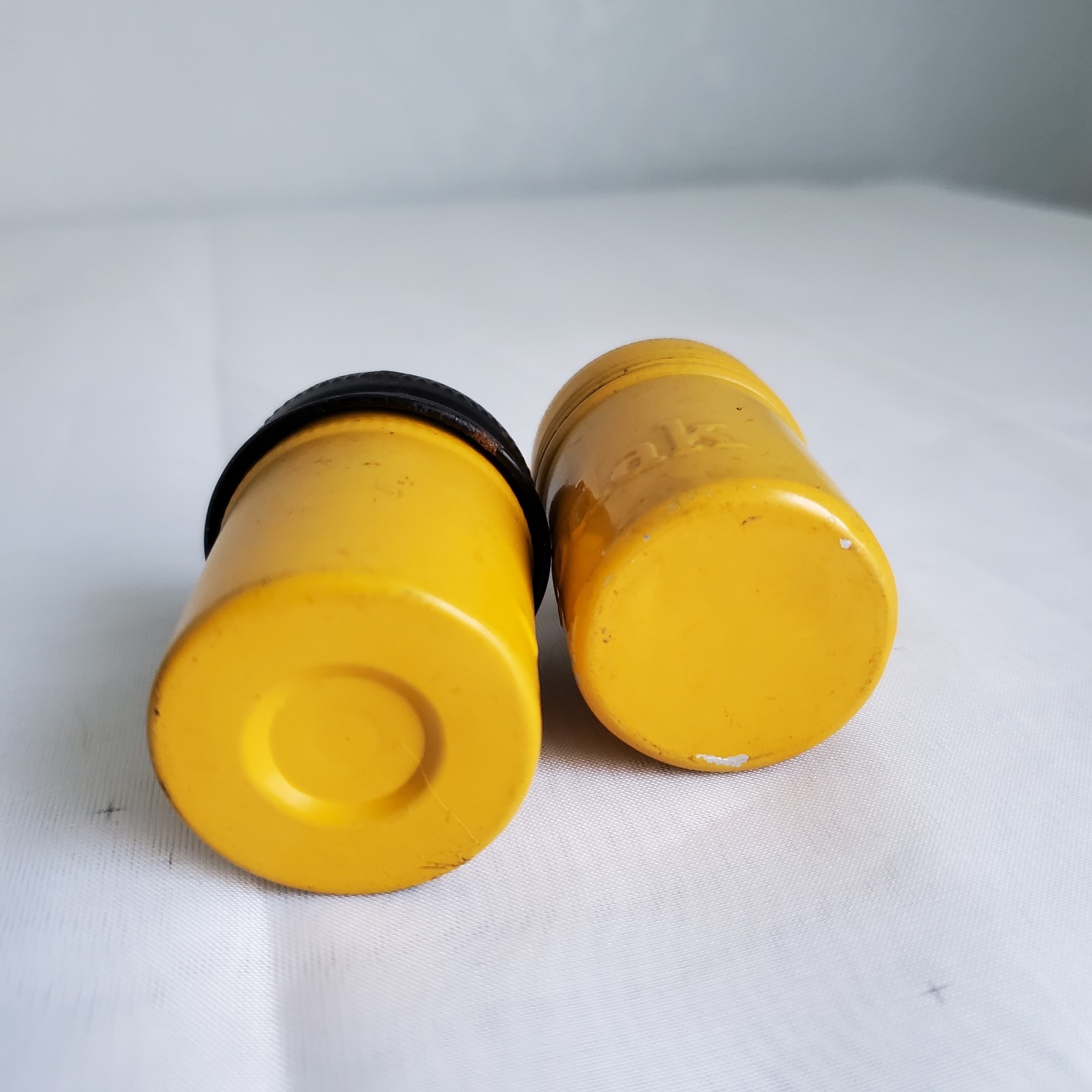 Lot of 2 Kodak Black Yellow Embossed Metal Film Roll Containers
