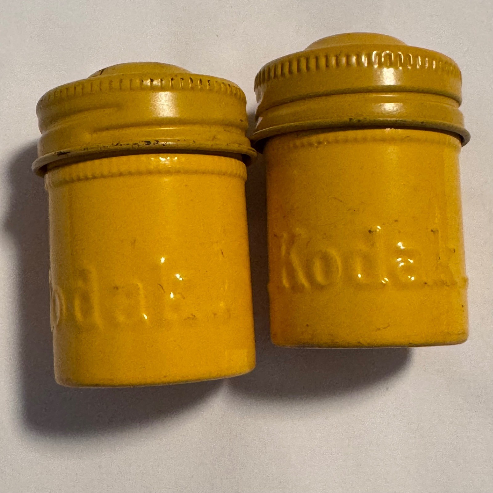 Vintage Kodak Embossed Yellow 35mm Film Canister Containers Lids Set of 2