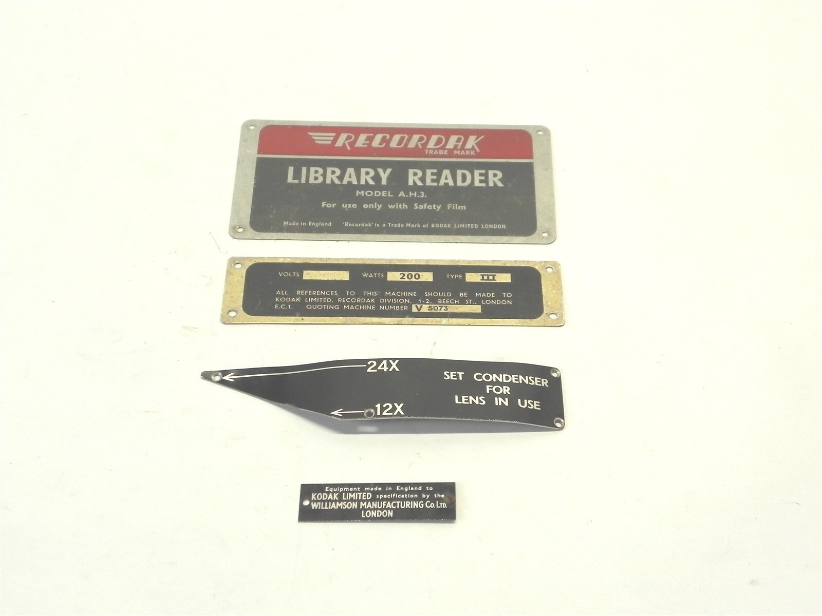 VINTAGE 1960’S KODAK RECORDAK MODEL A.H.3. LIBRARY READER NAMEPLATE AND 3 OTHERS