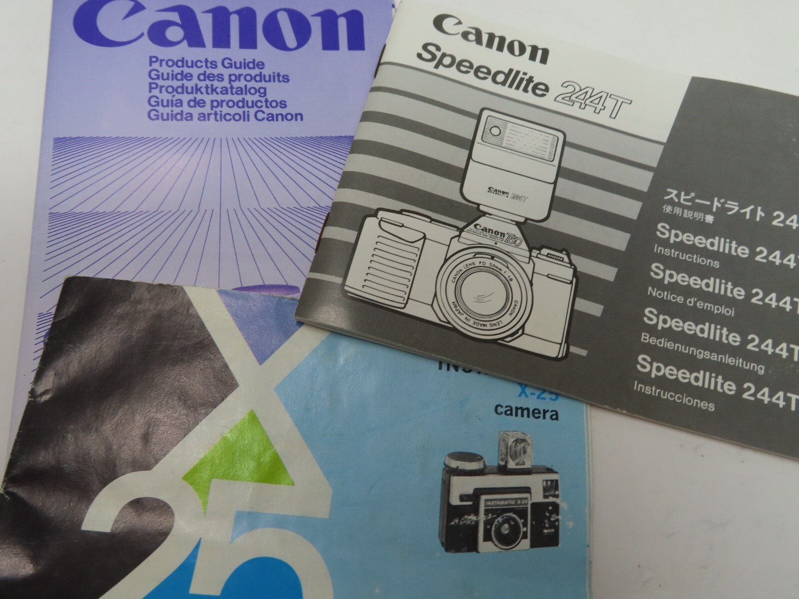 Vintage Lot Camera Product Guides Canon t50 Speedlite FD Lens Kodak Instamatic