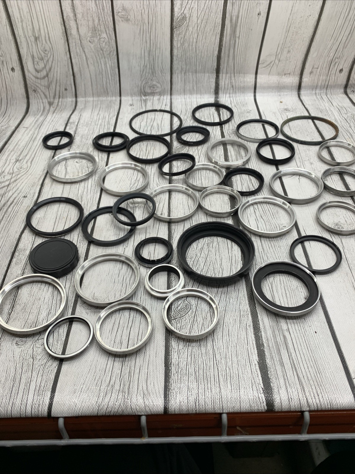 Vintage lot Camera Parts Hoods Caps Lens Adapters 36 pieces