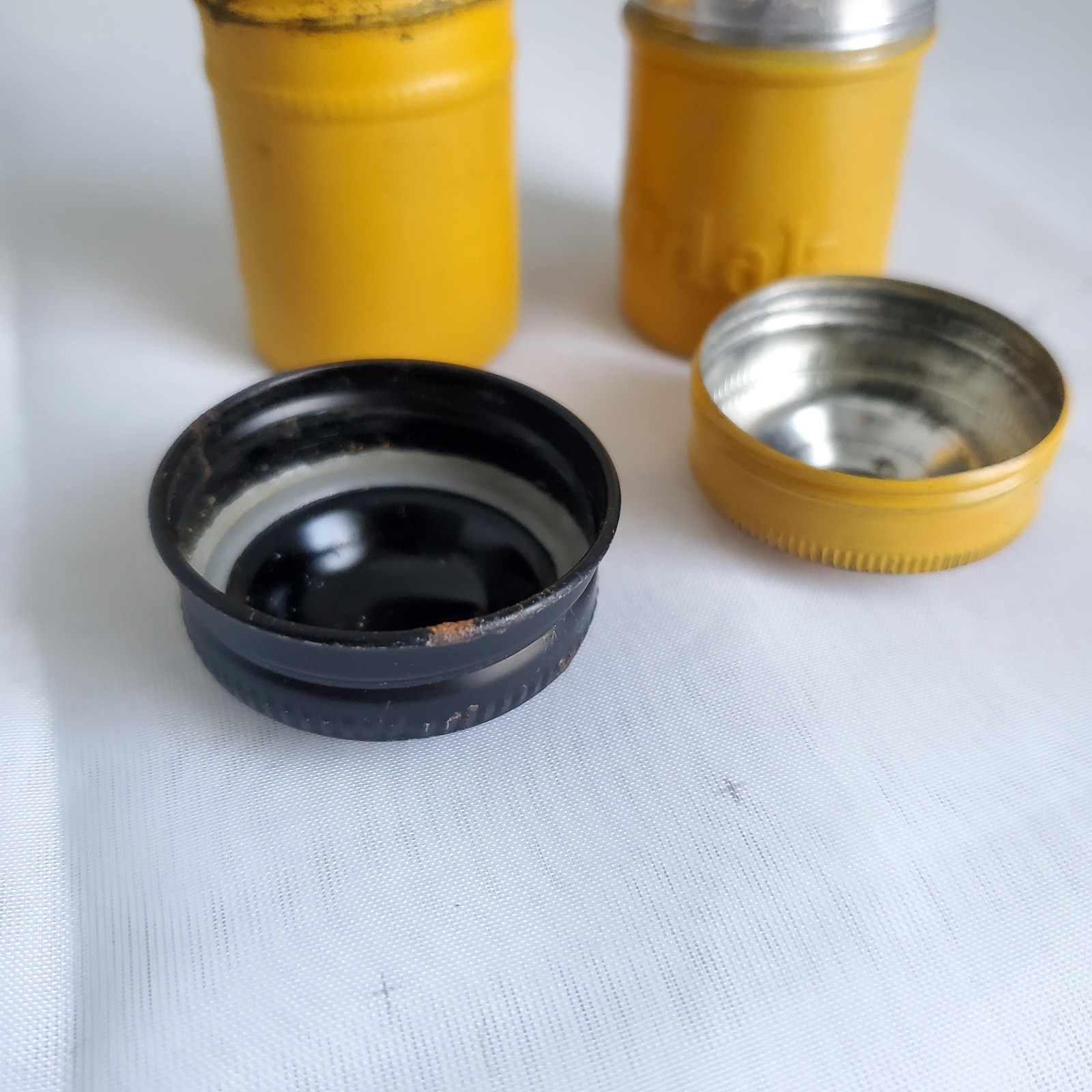 Lot of 2 Kodak Black Yellow Embossed Metal Film Roll Containers