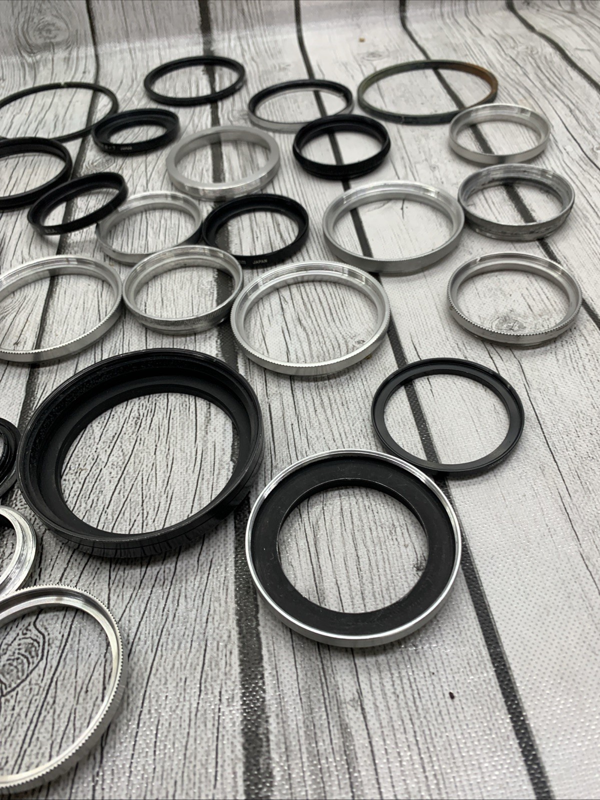 Vintage lot Camera Parts Hoods Caps Lens Adapters 36 pieces
