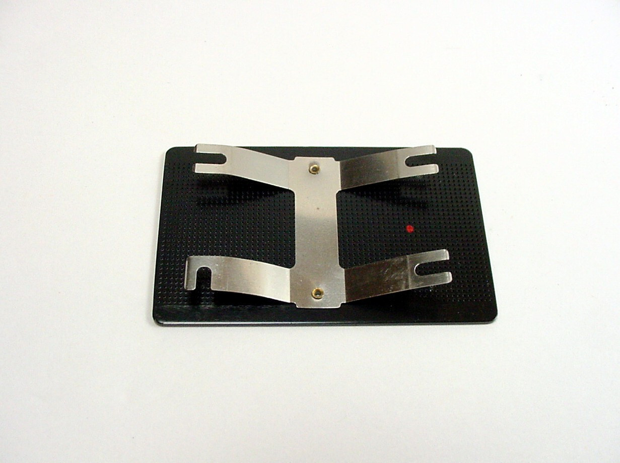 Nikon Nikkormat film pressure plate | $12 | #36 |