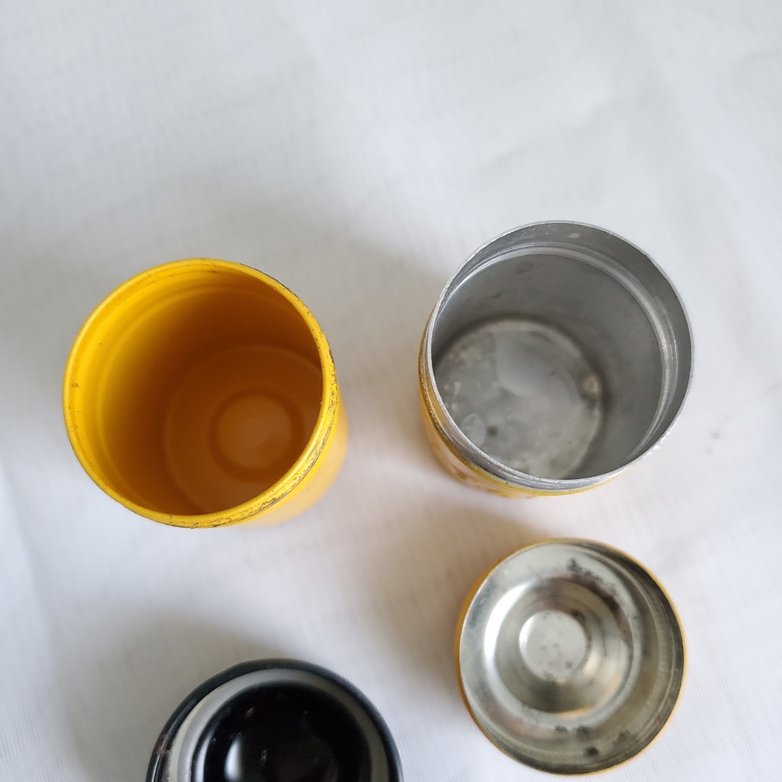 Lot of 2 Kodak Black Yellow Embossed Metal Film Roll Containers
