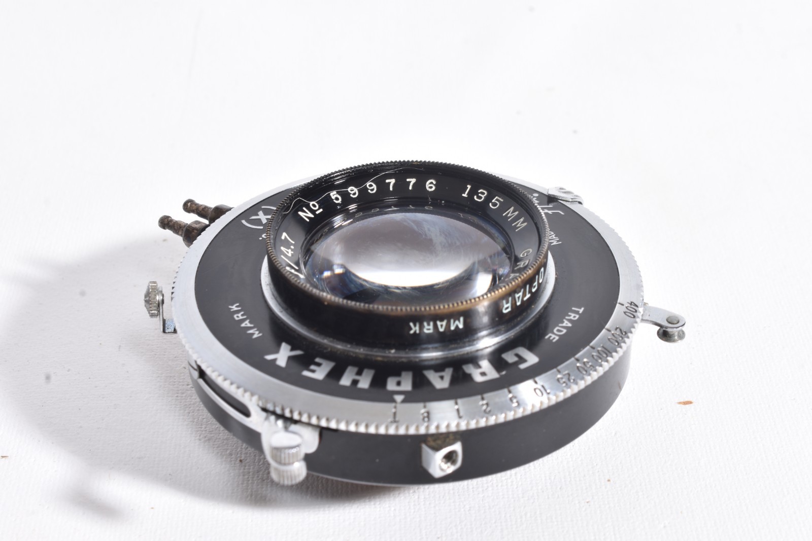 Graflex Wollensak Optar 135mm f/4.7 lens in a Graphex Shutter & Metal Lens Board