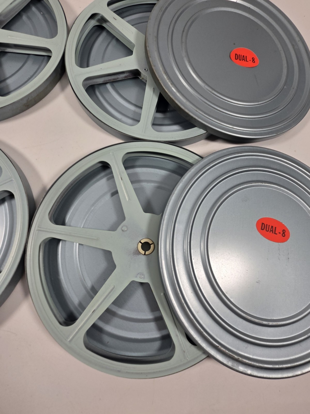 Set Of 4 Vintage Dual-8 8mm 7 in metal reel and can Old School Tv Nostalgia