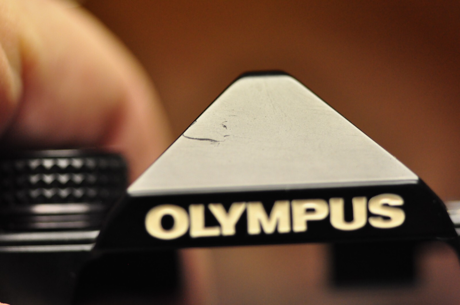Olympus model OM-2n 35mm SLR black replacement top cover. Nos. READ. I