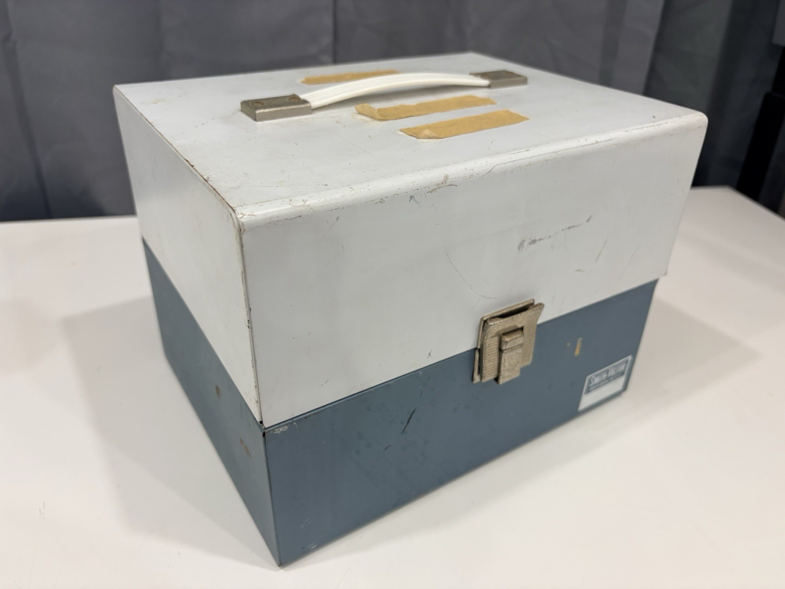 13 vintage 8mm film reels with 12 canisters and carrying case. No Film.