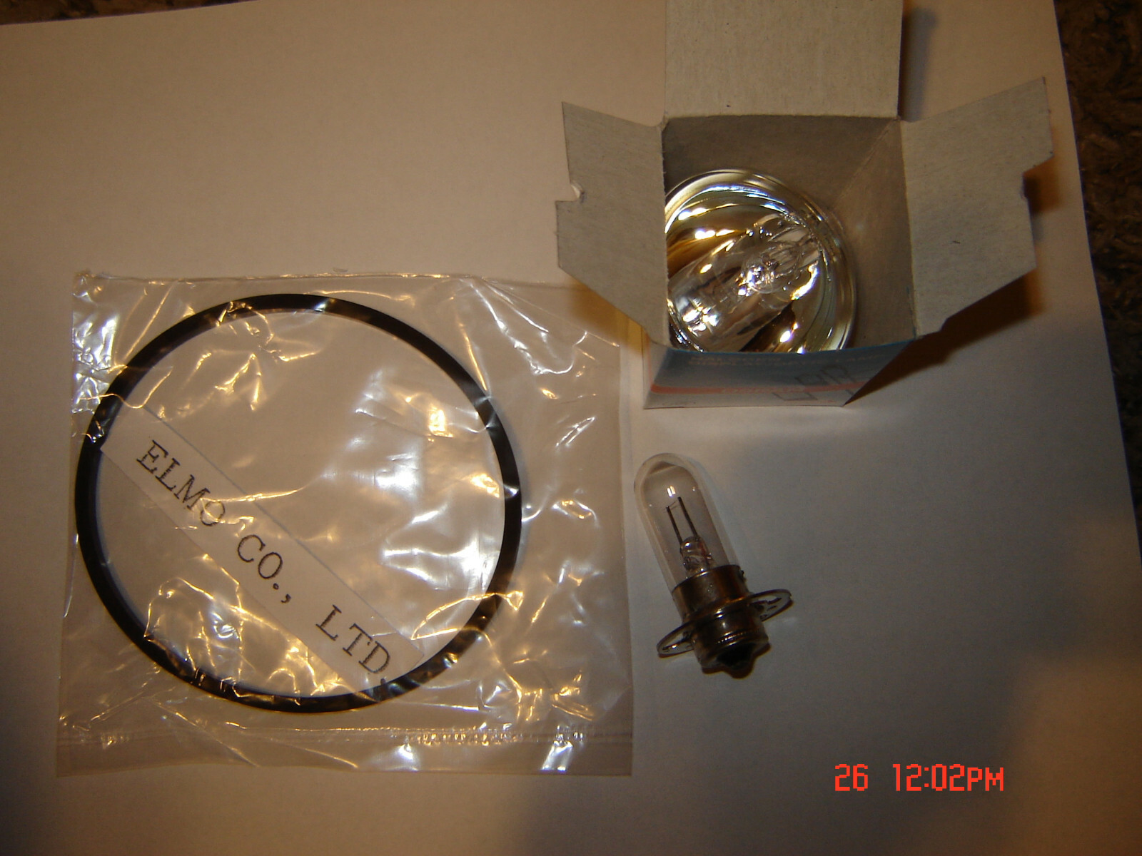 Elmo ST-1200 Projector, 1 Motor Drive Belt.1,15 V Lamp.1 ,4 V lamp. 3 piece set