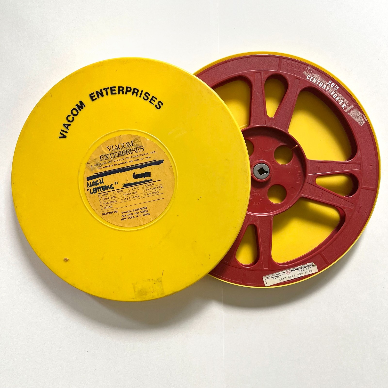 Assorted empty 1200′ 16mm Film Reels (3) and Canisters (4) incl. Fox / M*A*S*H