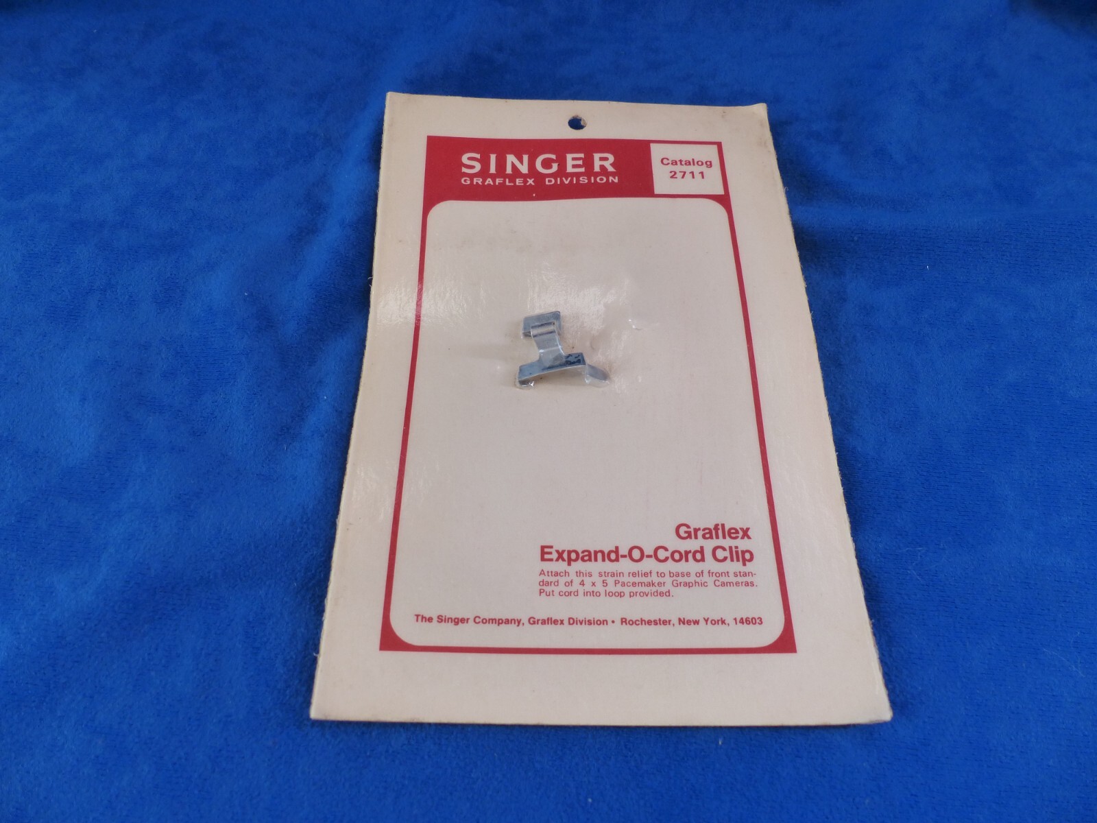 Vintage Singer Graflex Expand-O-Cord clip in original package, catalog No. 2711