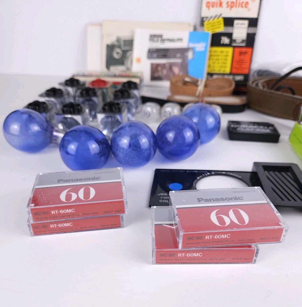 Junk Drawer Lot Of Vintage Camera Camcorder Parts – Bulbs Straps Tapes Manuals