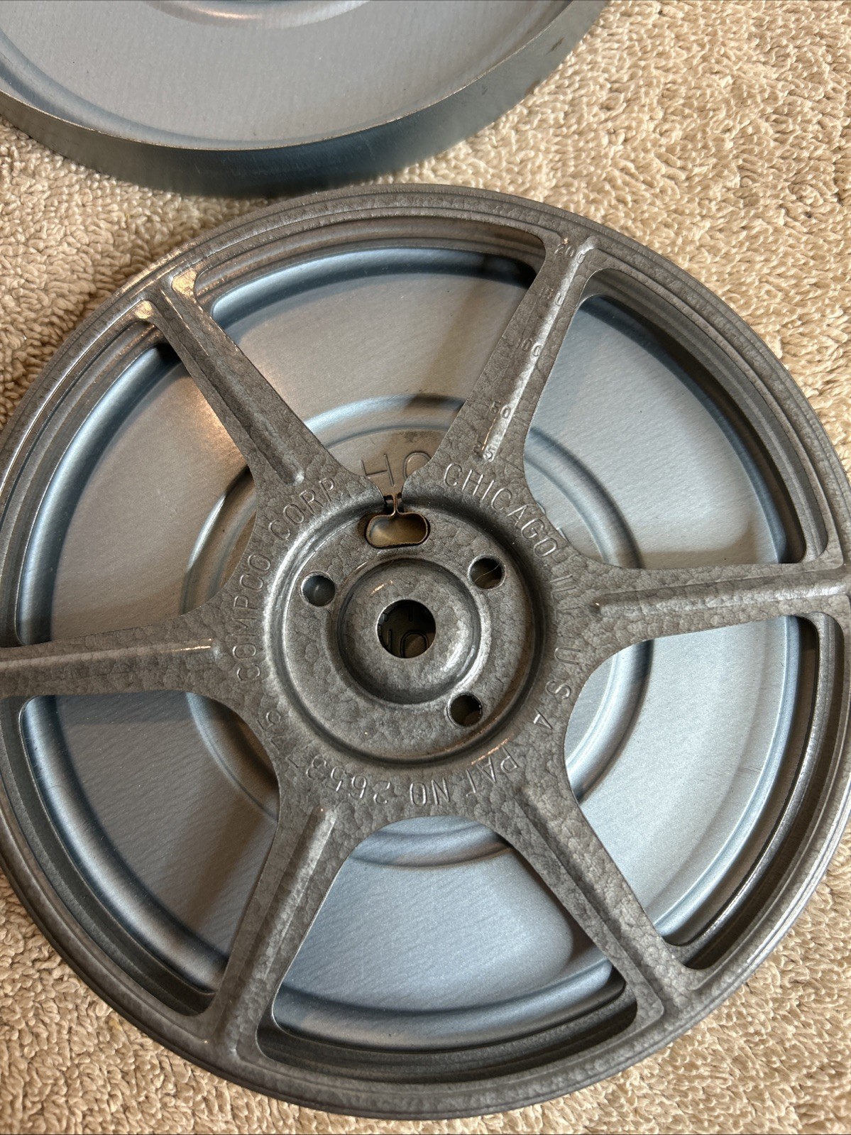 Two Vintage Stewart’s Anchorage Film Canisters In Grey With Mixed Reels 100-R07