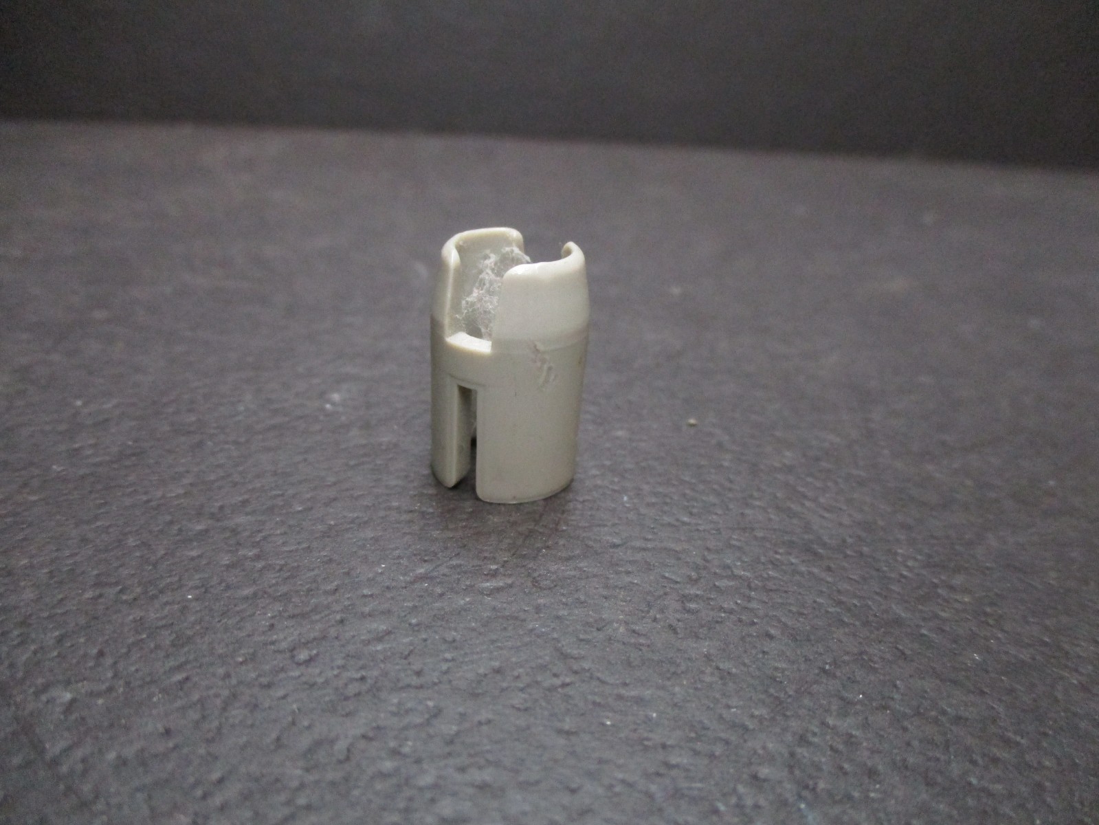 Adapter for a dual 8 movie projector to accept a Super 8 reel.