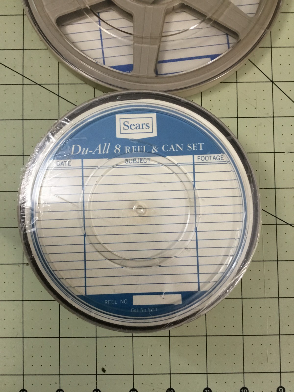 Four Vintage Sears 8mm Reel and Can Library Storage Sets – No 9312 and 9313