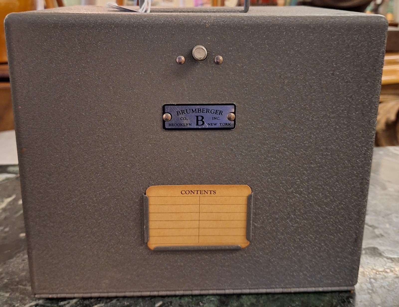 vintage Brumberger 8mm Brookyn N.Y. grey case holds 12 movies